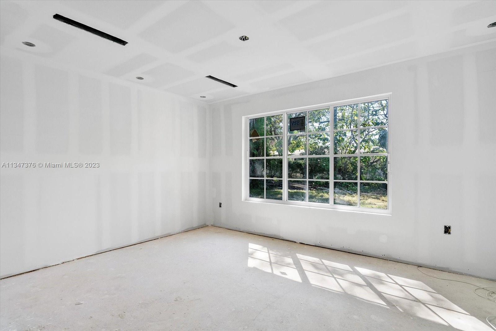 6230 Southwest 60th Street Miami, FL 33143 - Photo 33 of 57 a view of an empty room with a window