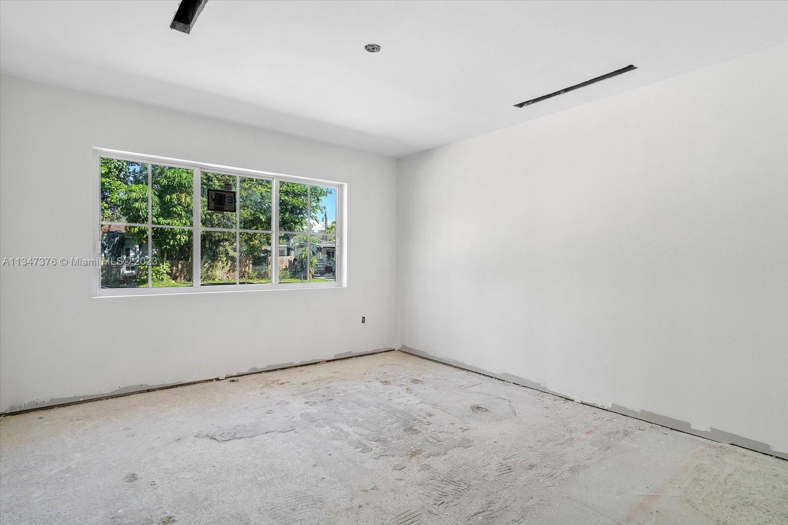 6230 Southwest 60th Street Miami, FL 33143 - Photo 36 of 57 an empty room with a window