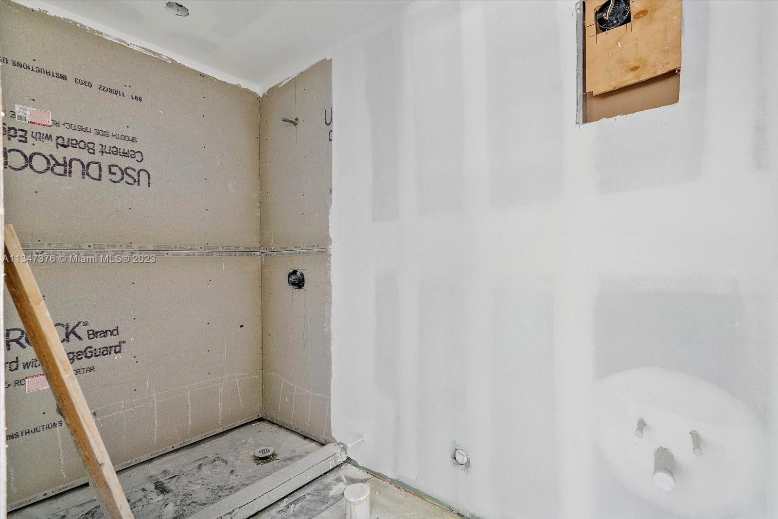 6230 Southwest 60th Street Miami, FL 33143 - Photo 38 of 57 a bathroom with a shower