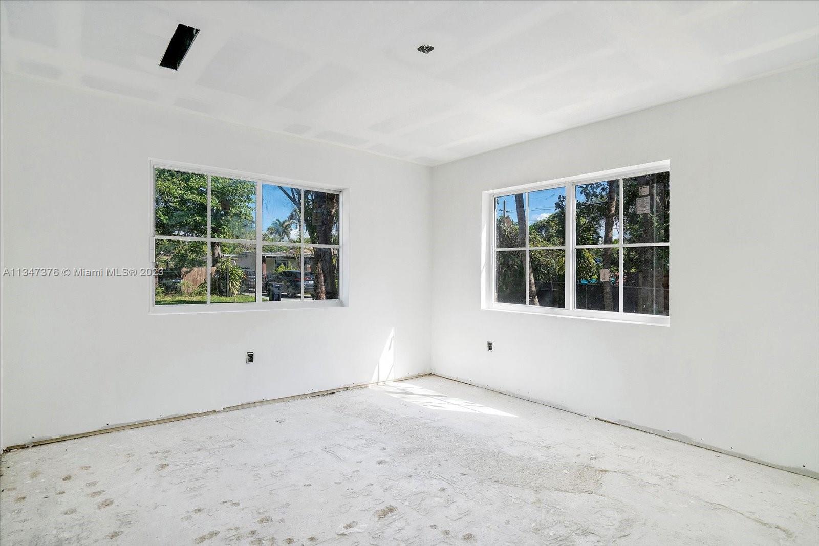 6230 Southwest 60th Street Miami, FL 33143 - Photo 39 of 57 a view of an empty room with a window