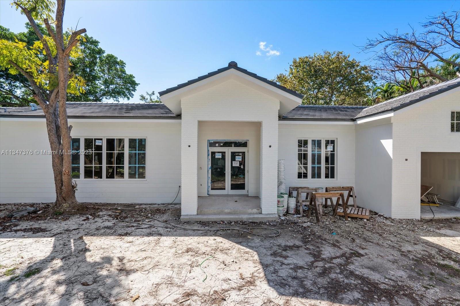 6230 Southwest 60th Street Miami, FL 33143 - Photo 4 of 57 a front view of a house