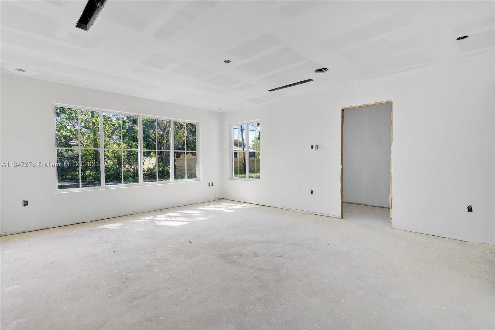 6230 Southwest 60th Street Miami, FL 33143 - Photo 44 of 57 a view of an empty room with a window