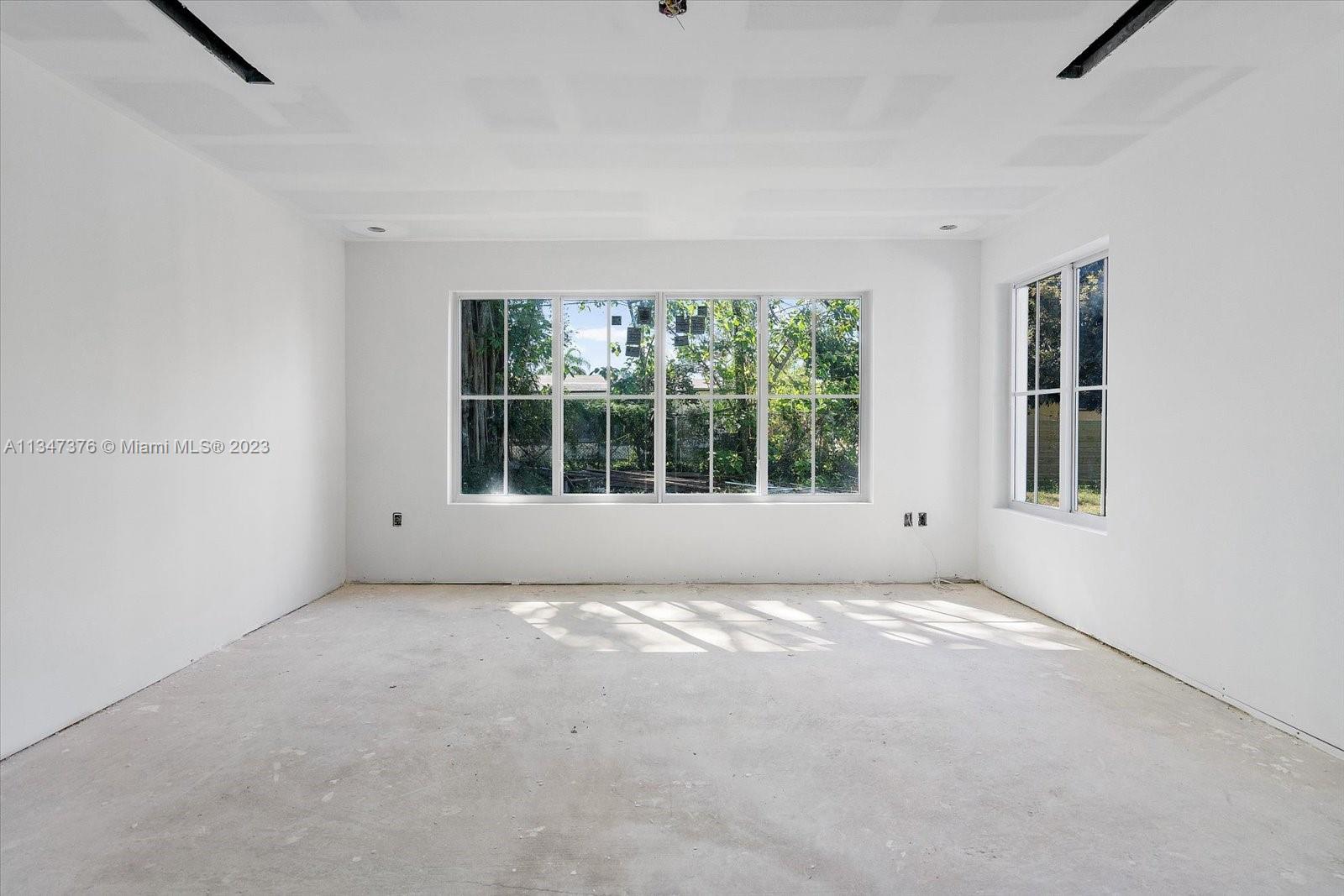 6230 Southwest 60th Street Miami, FL 33143 - Photo 45 of 57 a view of an empty room with a window