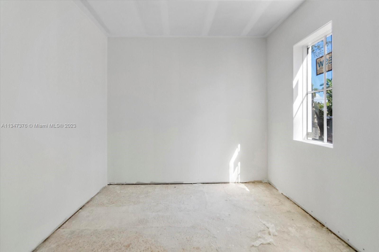 6230 Southwest 60th Street Miami, FL 33143 - Photo 46 of 57 an empty room with windows