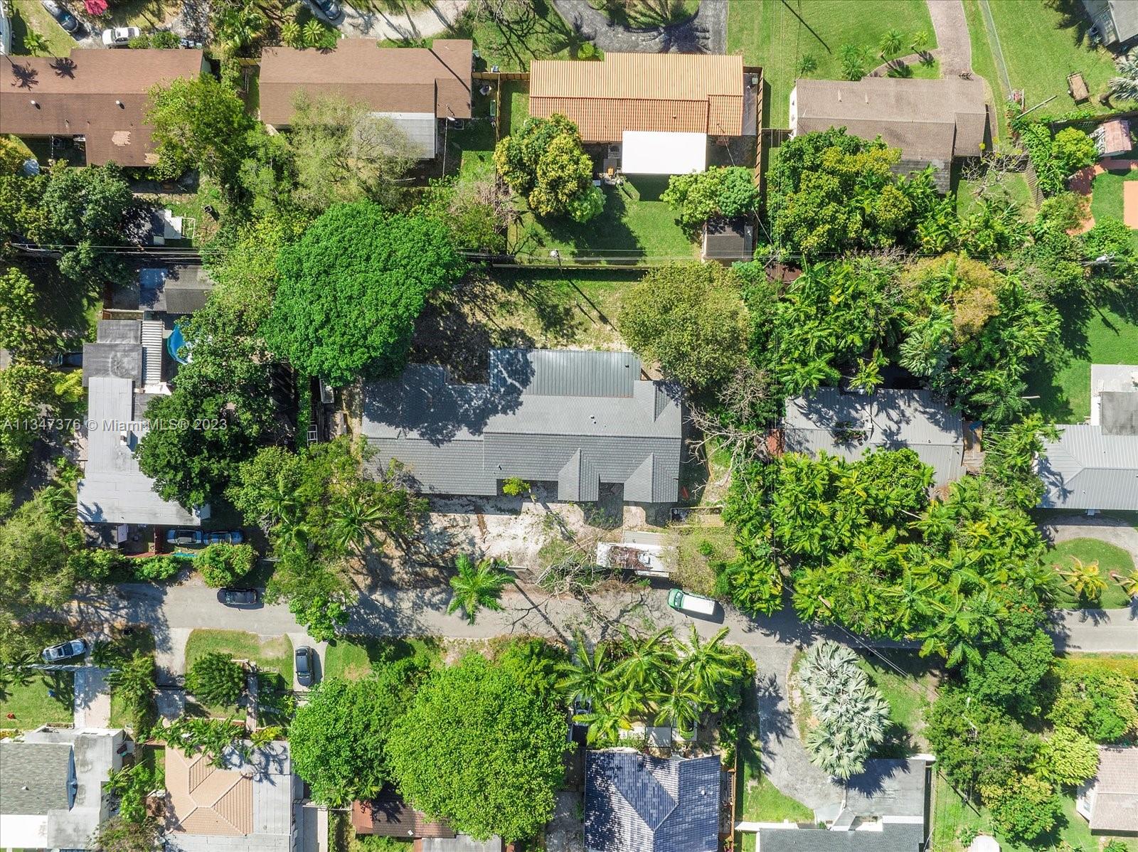 6230 Southwest 60th Street Miami, FL 33143 - Photo 54 of 57 an aerial view of a house with a garden