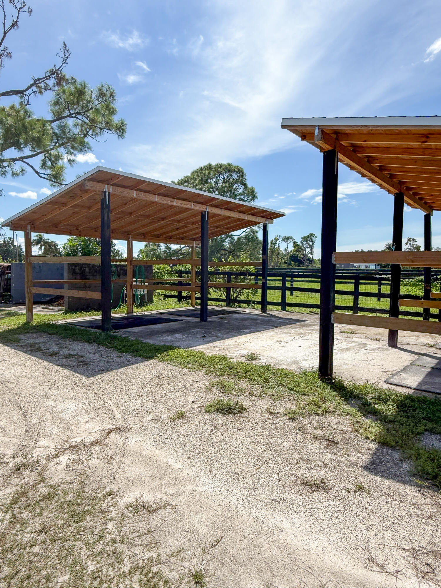 16031 Rustic Road Wellington, FL 33470 - Photo 7 of 11 a view of outdoor space with a patio