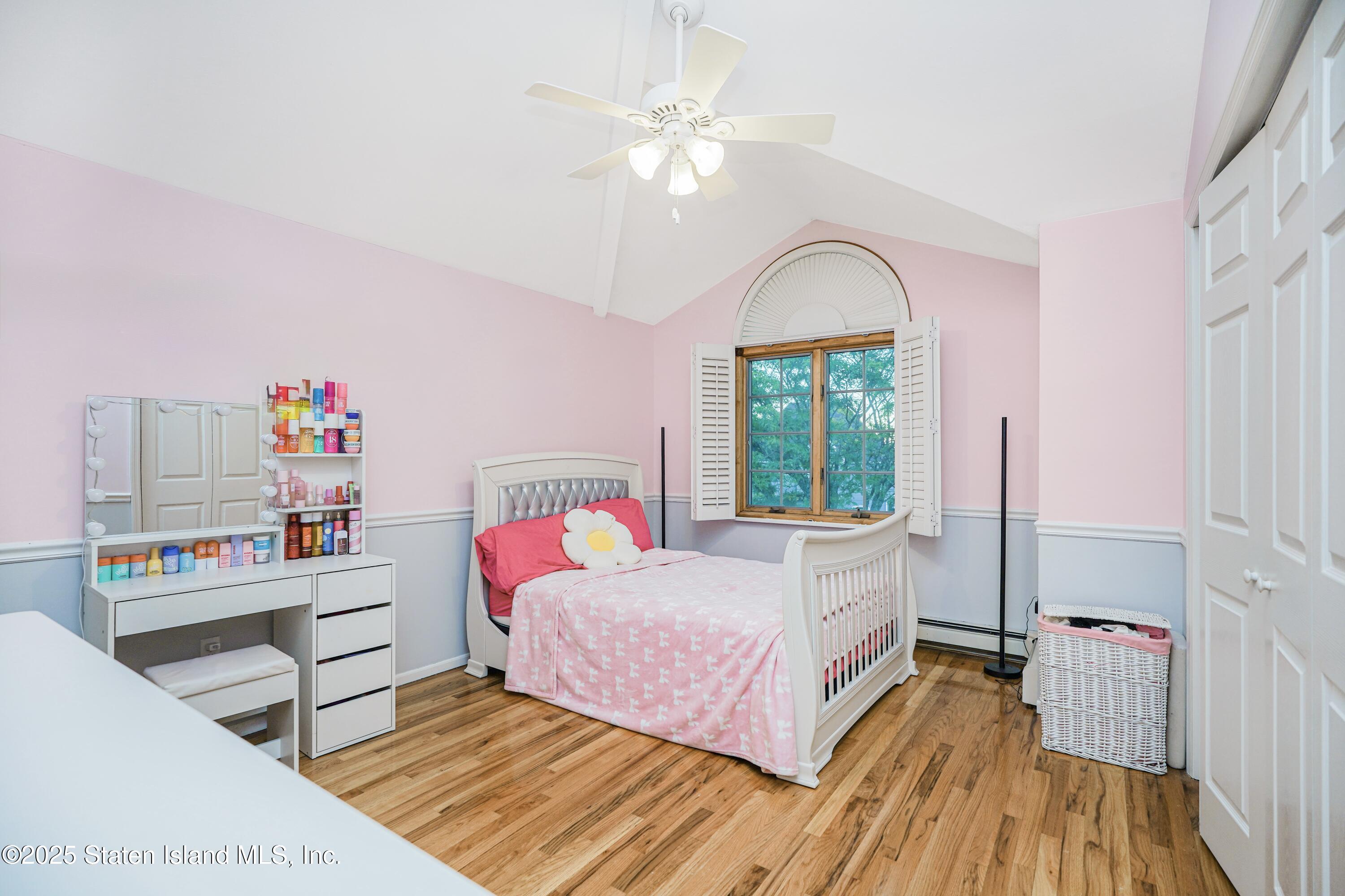 145 Shirley Avenue Staten Island, NY 10312 - Photo 16 of 29 a bedroom with a bed and a window
