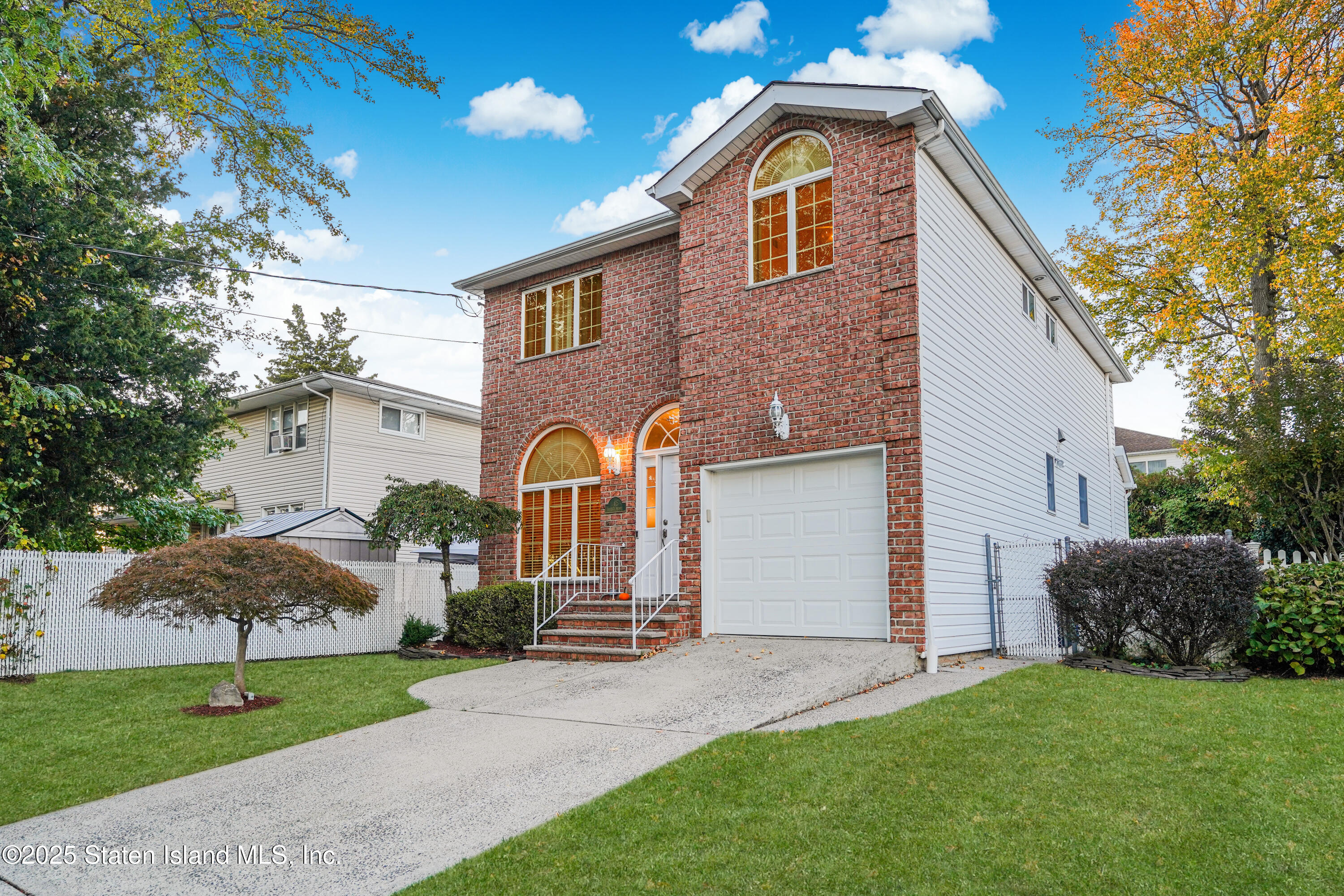 145 Shirley Avenue Staten Island, NY 10312 - Photo 2 of 29 a front view of house with yard and green space