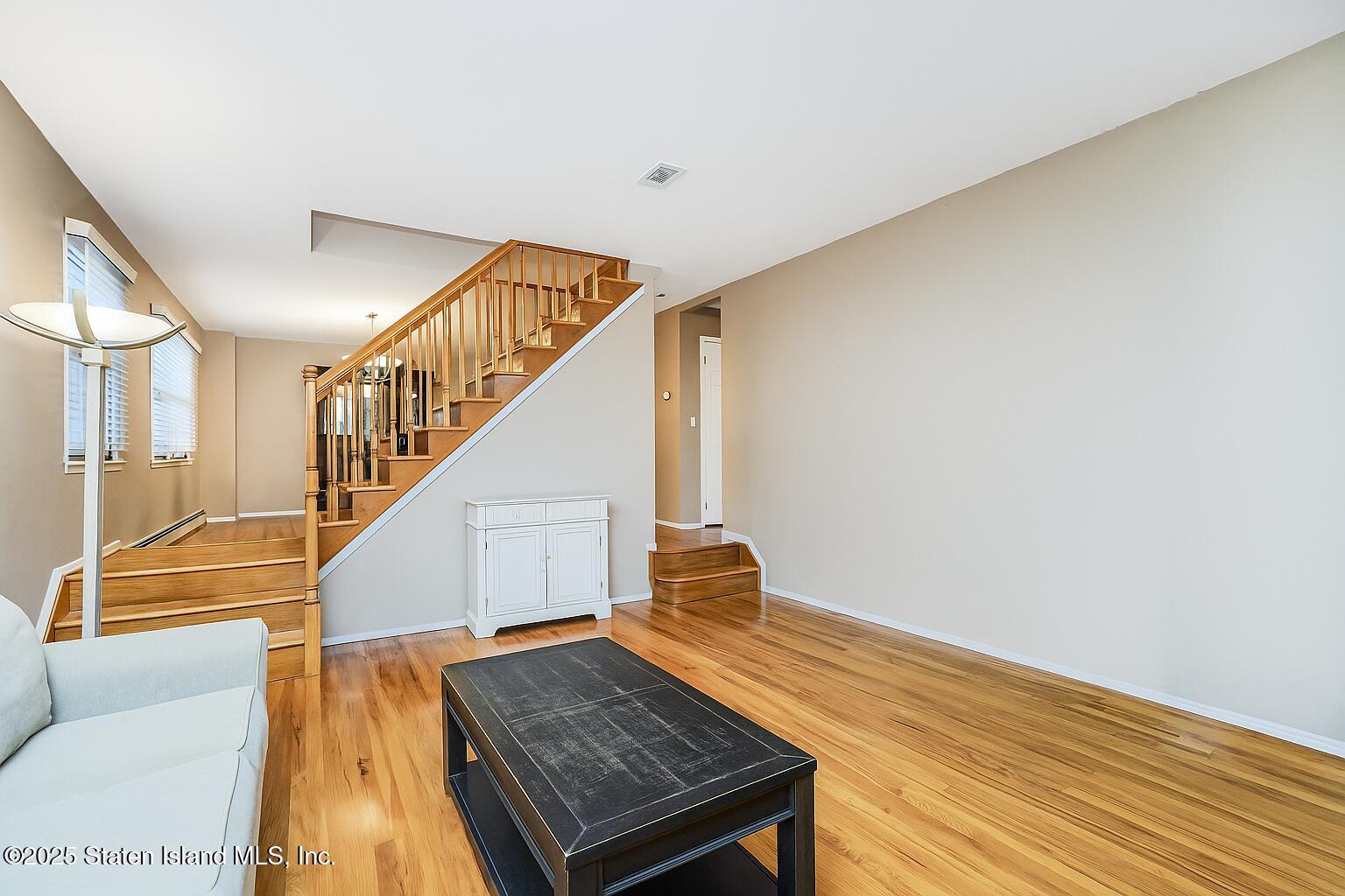 145 Shirley Avenue Staten Island, NY 10312 - Photo 4 of 29 a view of entryway and hall with wooden floor