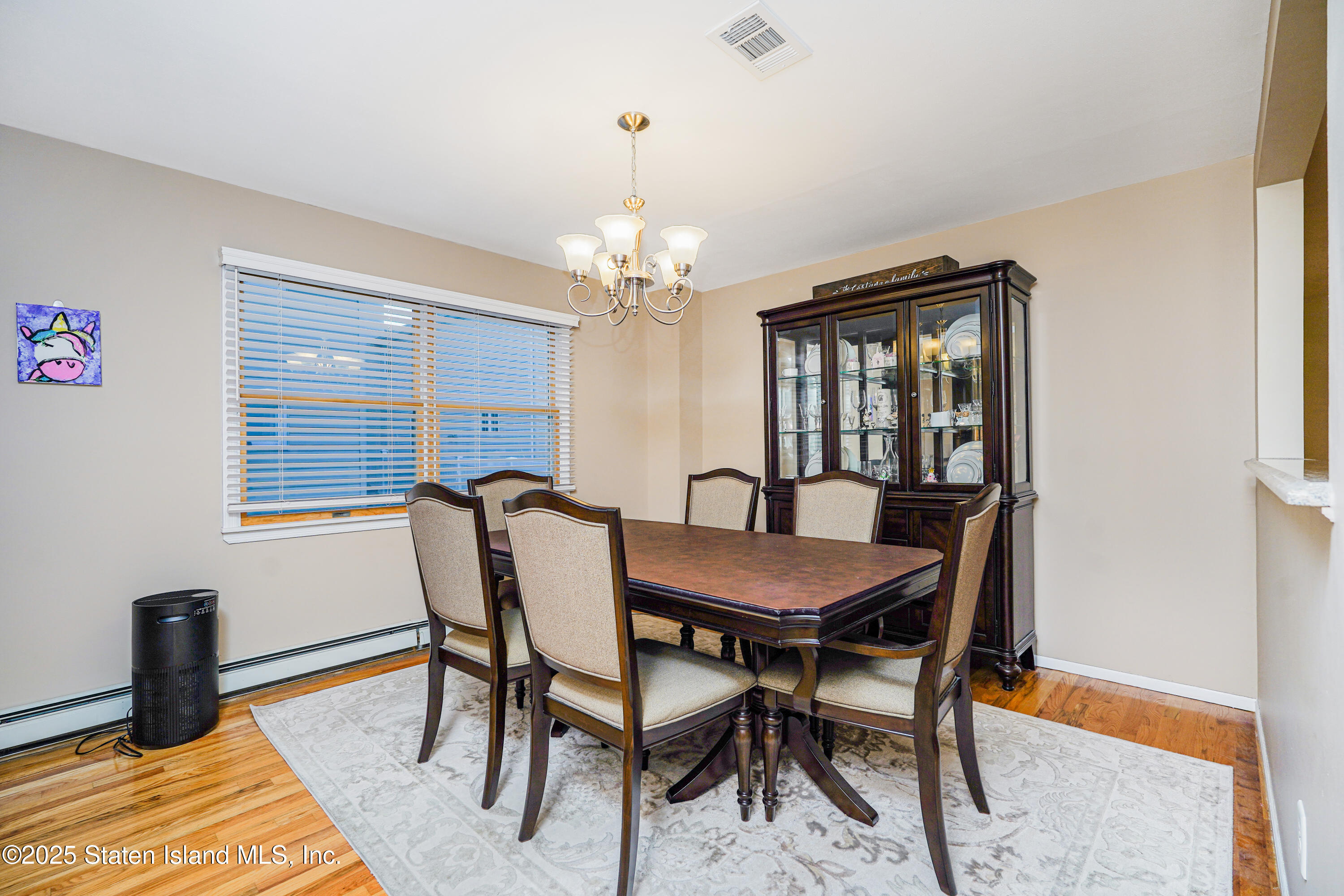 145 Shirley Avenue Staten Island, NY 10312 - Photo 7 of 29 a dining room with furniture and window