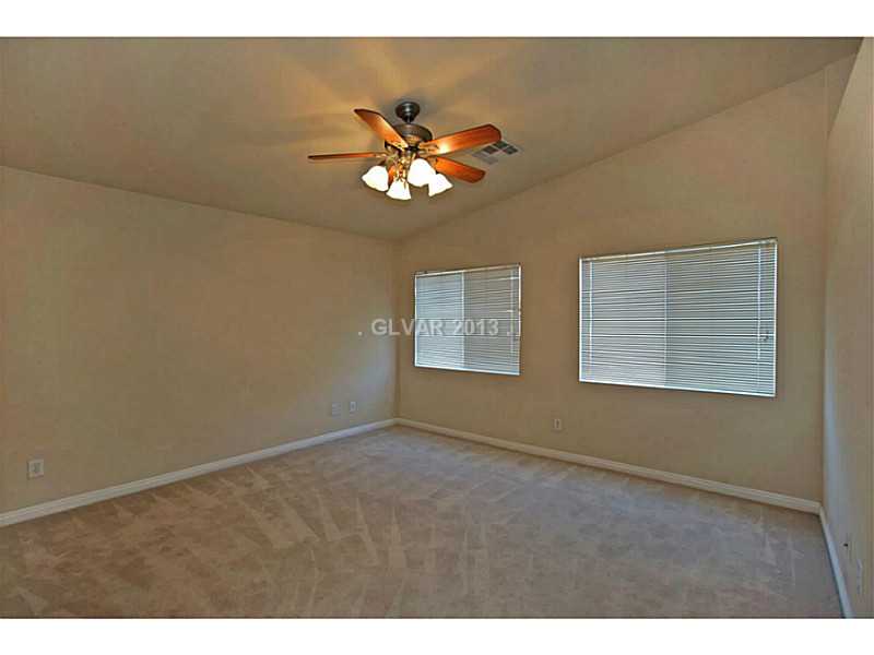 6589 Tumbleweed Ridge Lane, Unit 103 Henderson, NV 89011 - Photo 10 of 12 Master Bedroom.