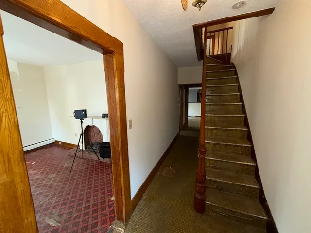 a view of hallway with stairs