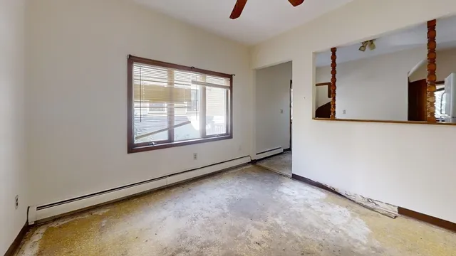 an empty room with windows