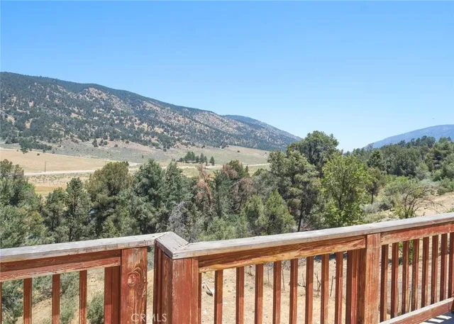 a balcony with an outdoor space