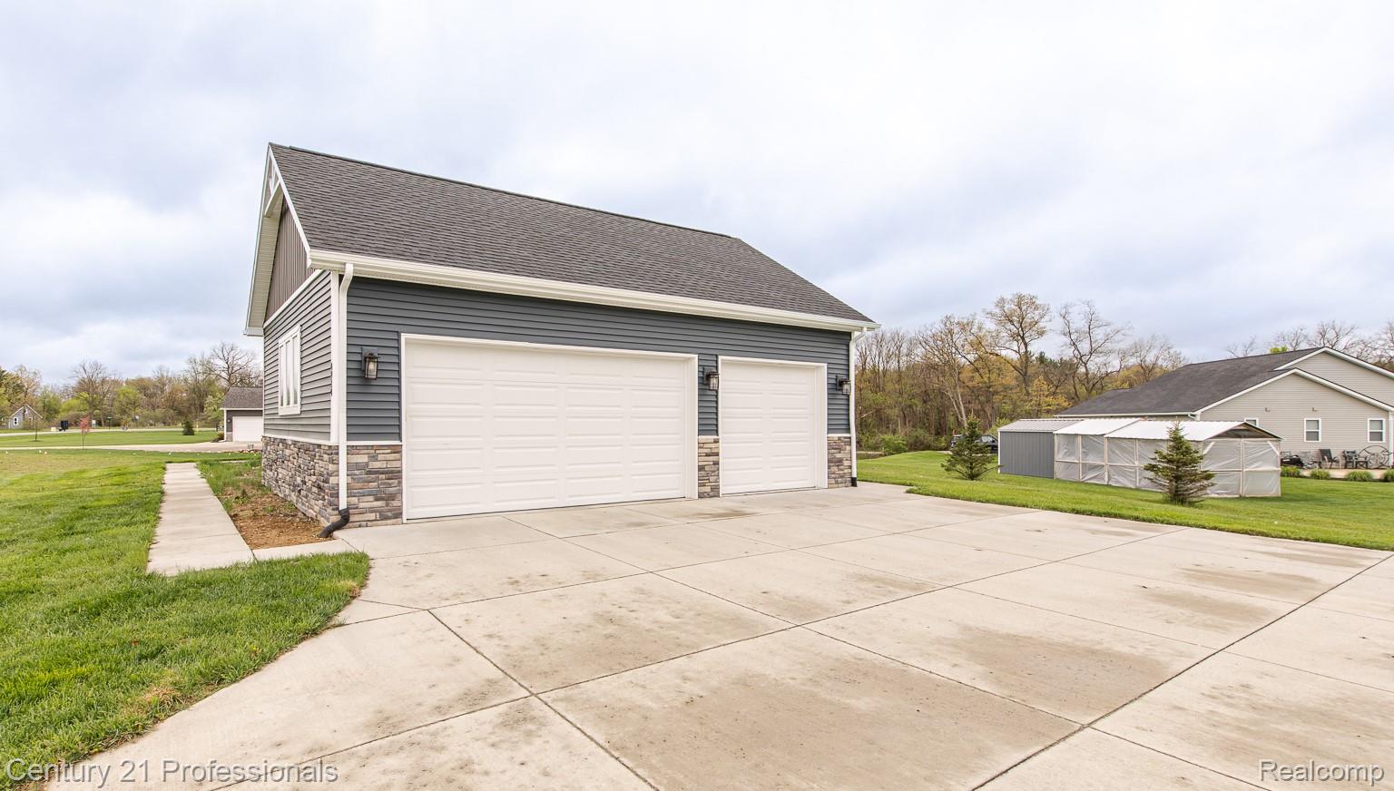 4914 TORATOLA Lane Howell, MI 48843 - Photo 32 of 39 View of detached garage