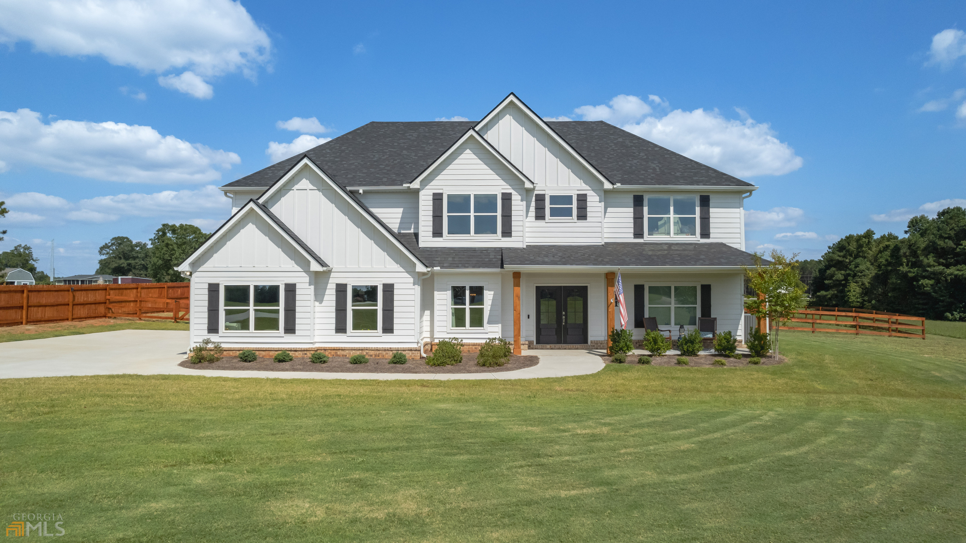 908 Old Stagecoach Road Carrollton, GA 30116 - Photo 1 of 1 a front view of a house with garden