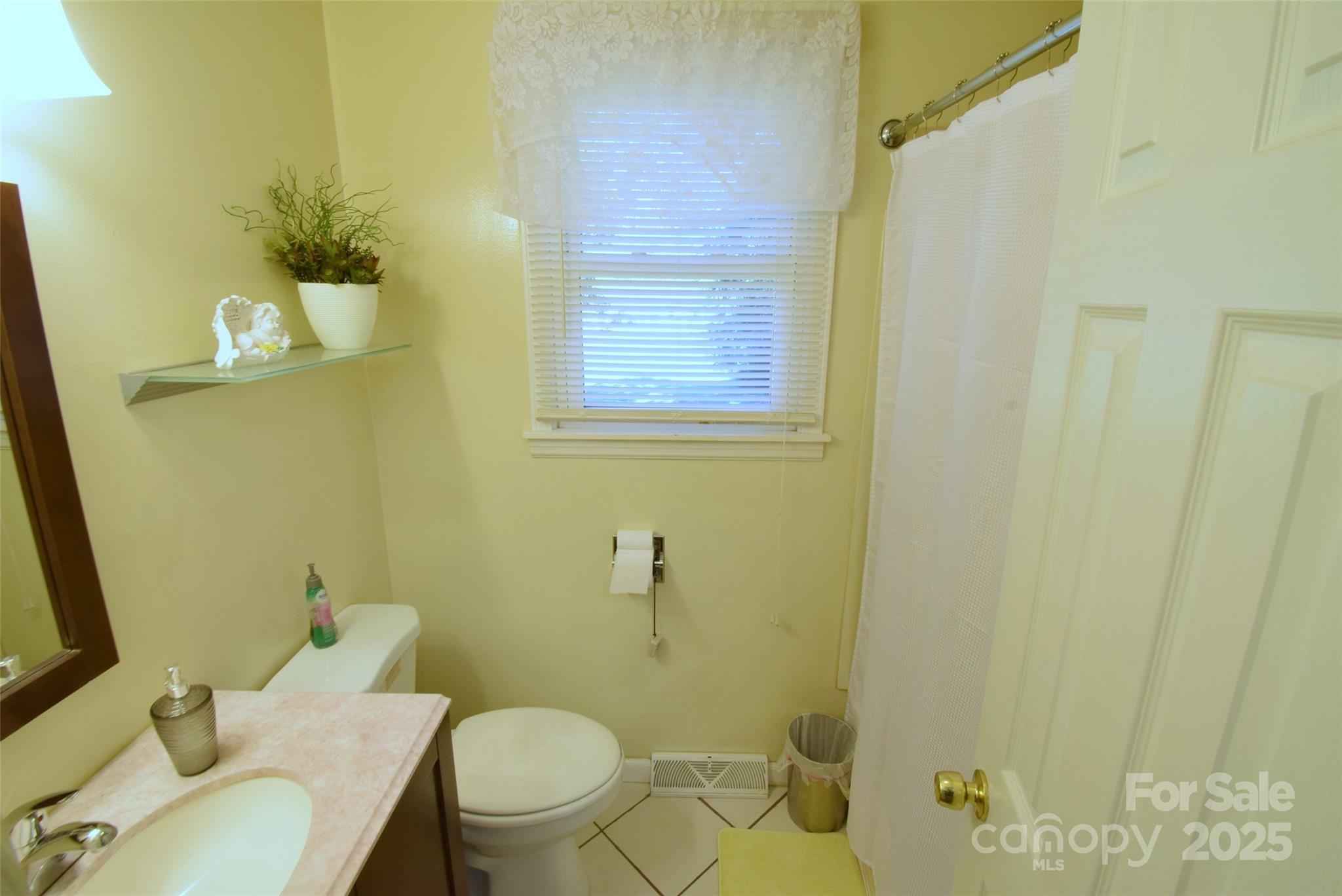 505 Butler Court Gastonia, NC 28054 - Photo 21 of 41 a bathroom with a toilet sink and shower
