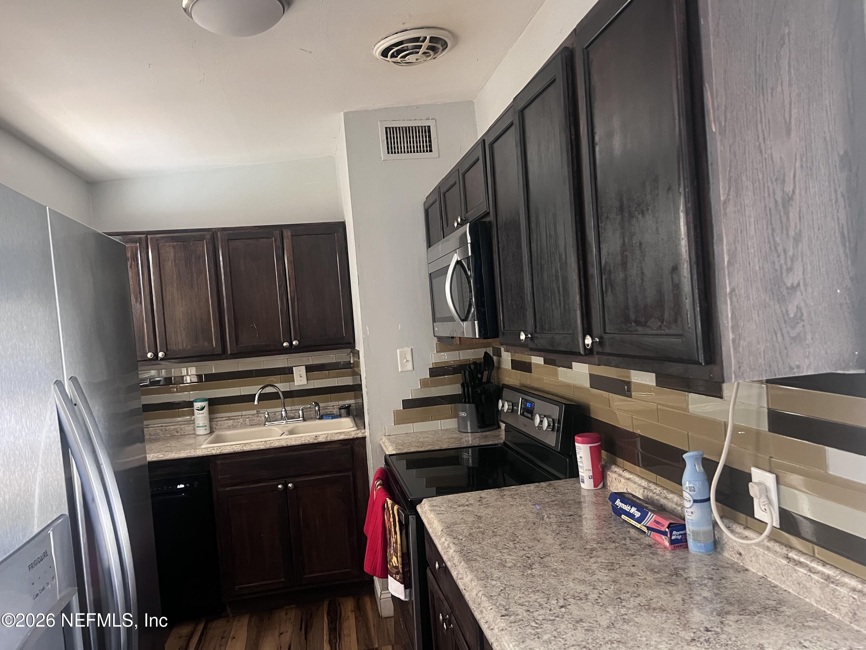 9129 Spottswood Road Jacksonville, FL 32208 - Photo 9 of 13 Kitchen (2)