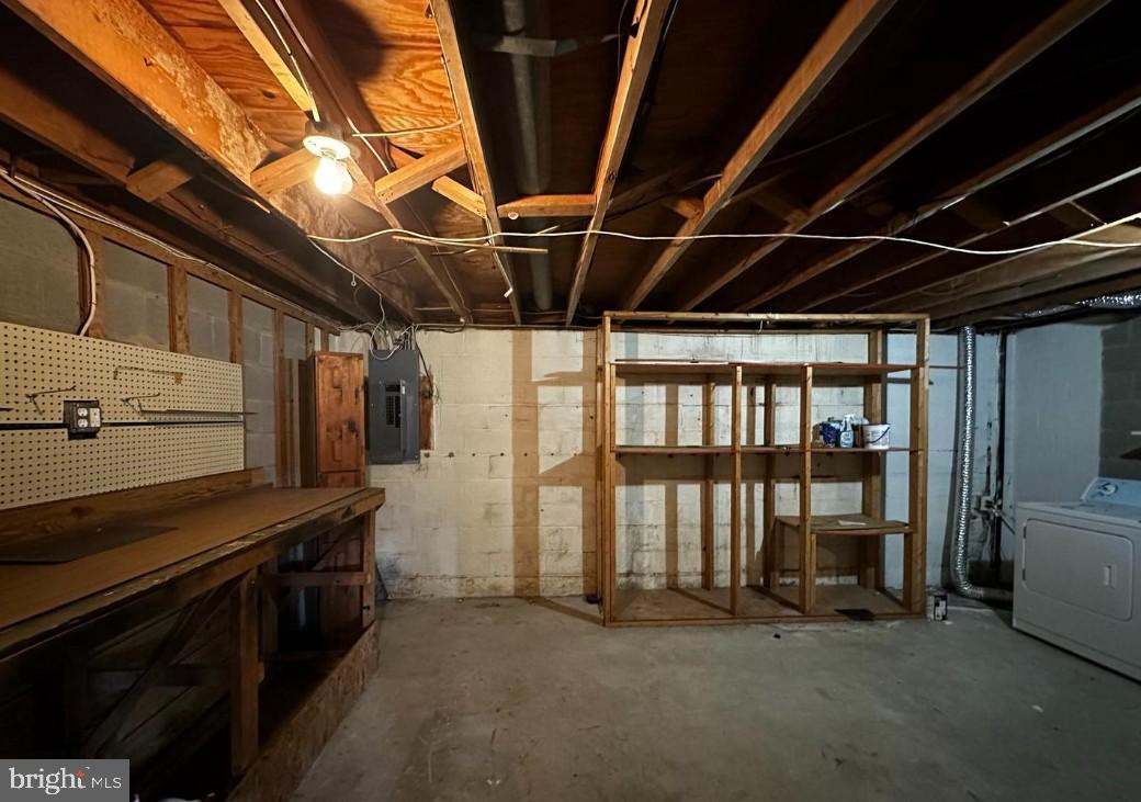5651 Selford Road Halethorpe, MD 21227 - Photo 15 of 19 a view of an empty room with a dishwasher and a refrigerator