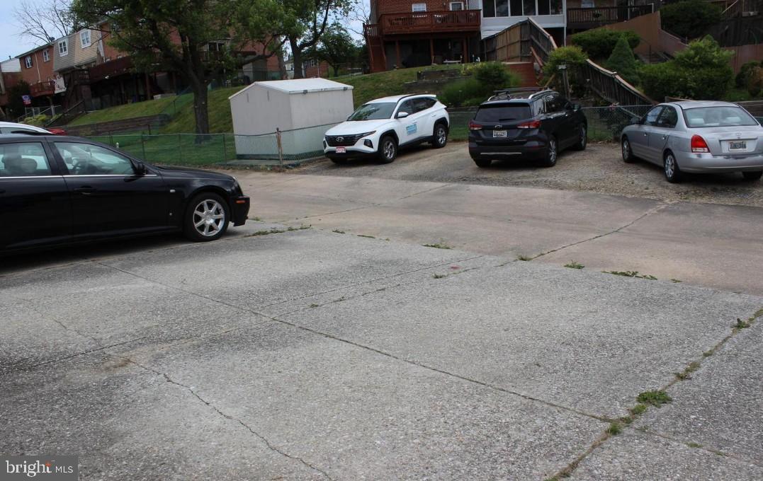 5651 Selford Road Halethorpe, MD 21227 - Photo 18 of 19 a car parked on the side of a street