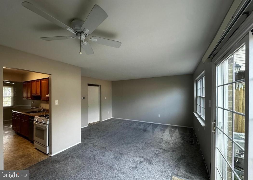 5651 Selford Road Halethorpe, MD 21227 - Photo 6 of 19 a view of a livingroom with a kitchen