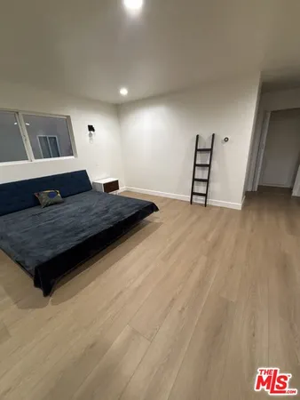 a living room with couch and a table