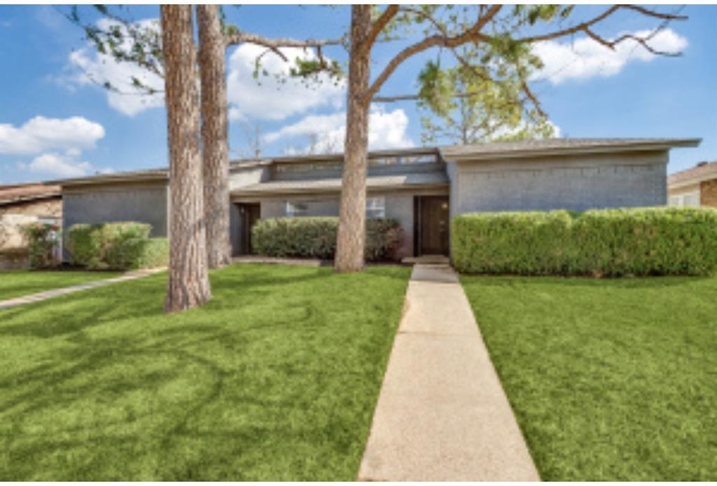 2733 St George Place Arlington, TX 76015 - Photo 1 of 1 a view of a yard with plants