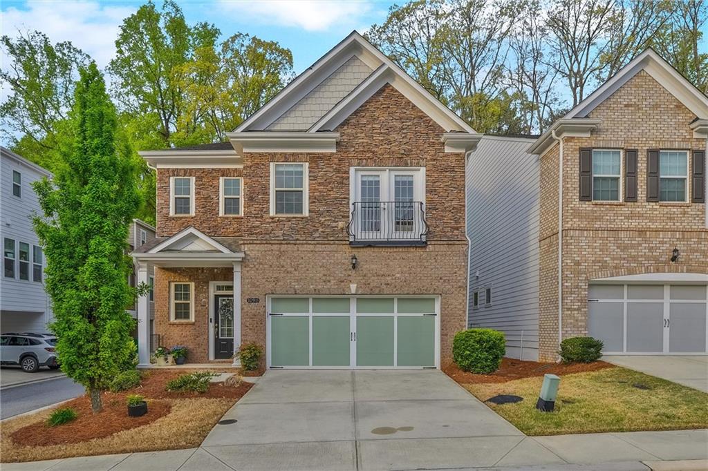 1098 Central Park Road Decatur, GA 30033 - Photo 1 of 1 a front view of a house with garden