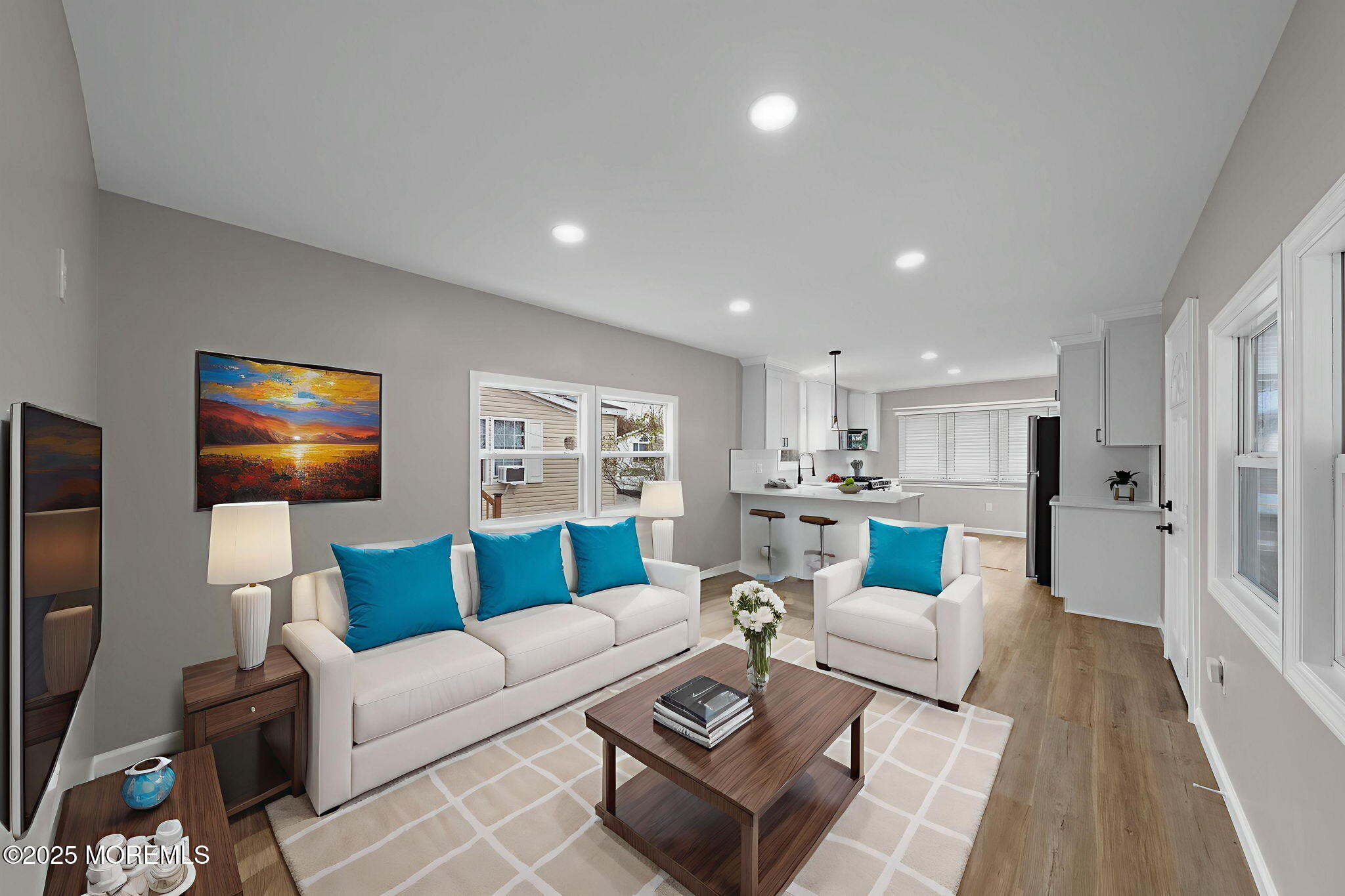 712 7th Street Jackson, NJ 08527 - Photo 16 of 37 a living room with furniture and a flat screen tv