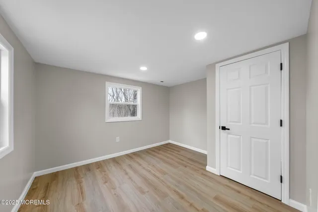 a view of a porch with wooden floor