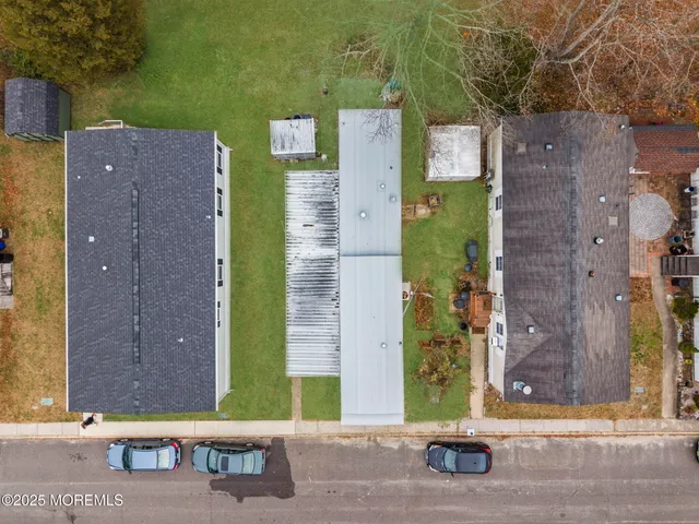 a view of a back yard of the house