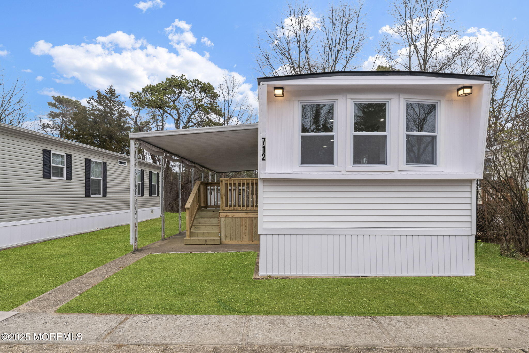 712 7th Street Jackson, NJ 08527 - Photo 4 of 37 a view of a house with a yard and a garden
