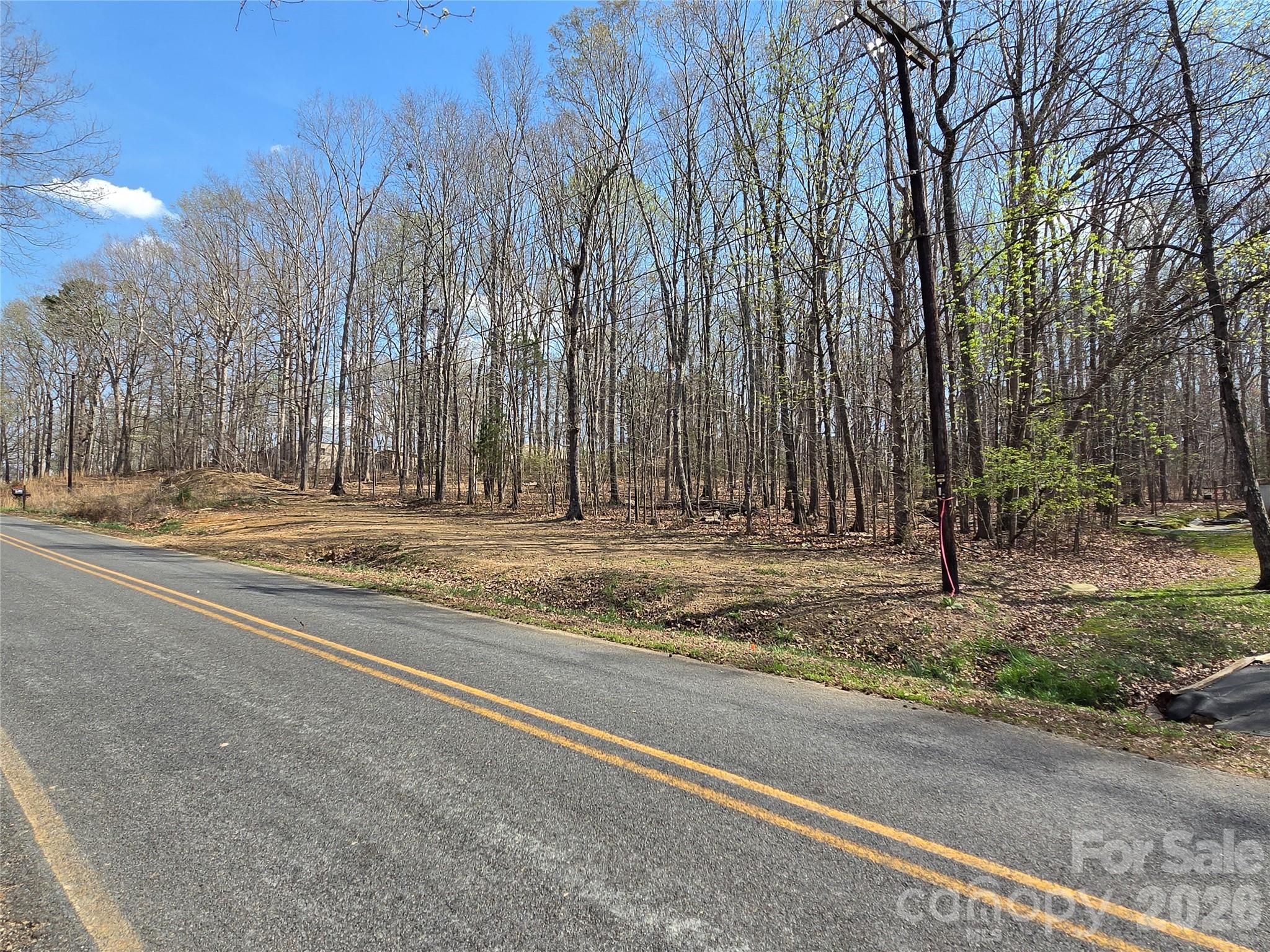 242 Sturdivant Road Garland, NC 28441 - Photo 2 of 9 a view of a house with a street