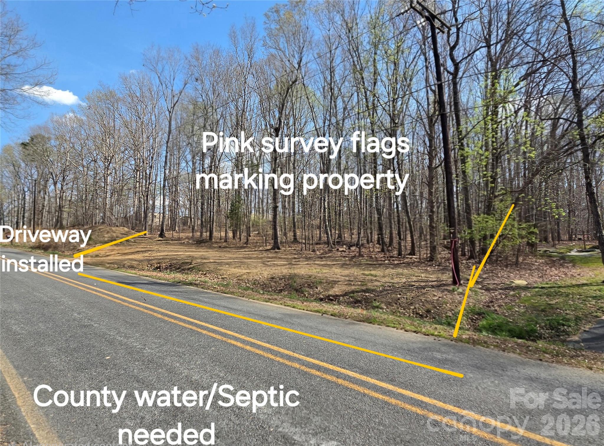 242 Sturdivant Road Garland, NC 28441 - Photo 6 of 9 a view of outdoor space with sign board