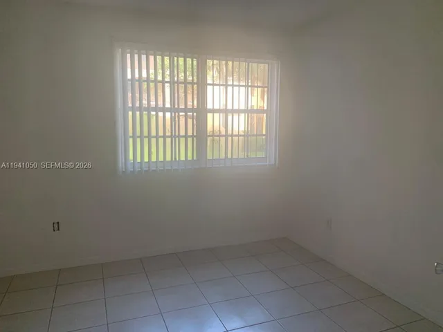 a kitchen with a stove and a microwave