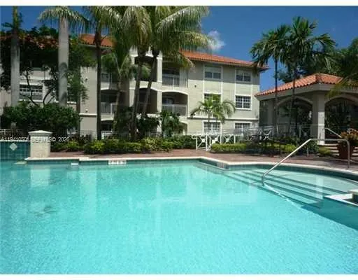 a view of a house with backyard sitting area and garden
