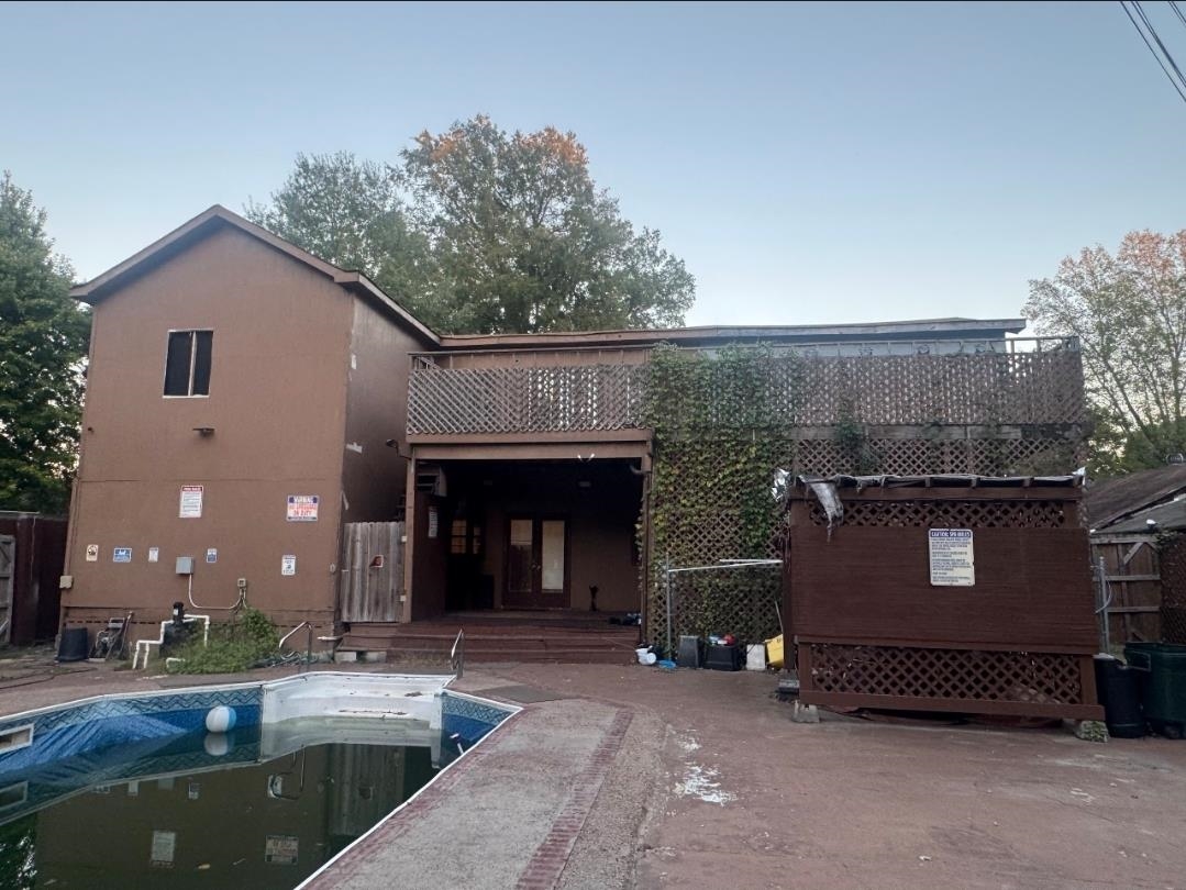 1497 Titus Road Memphis, TN 38111 - Photo 13 of 13 a front view of a house with yard