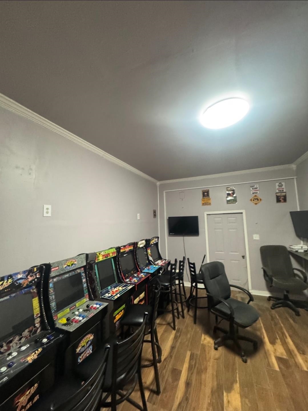 1497 Titus Road Memphis, TN 38111 - Photo 2 of 13 a view of a livingroom with furniture and a flat screen tv