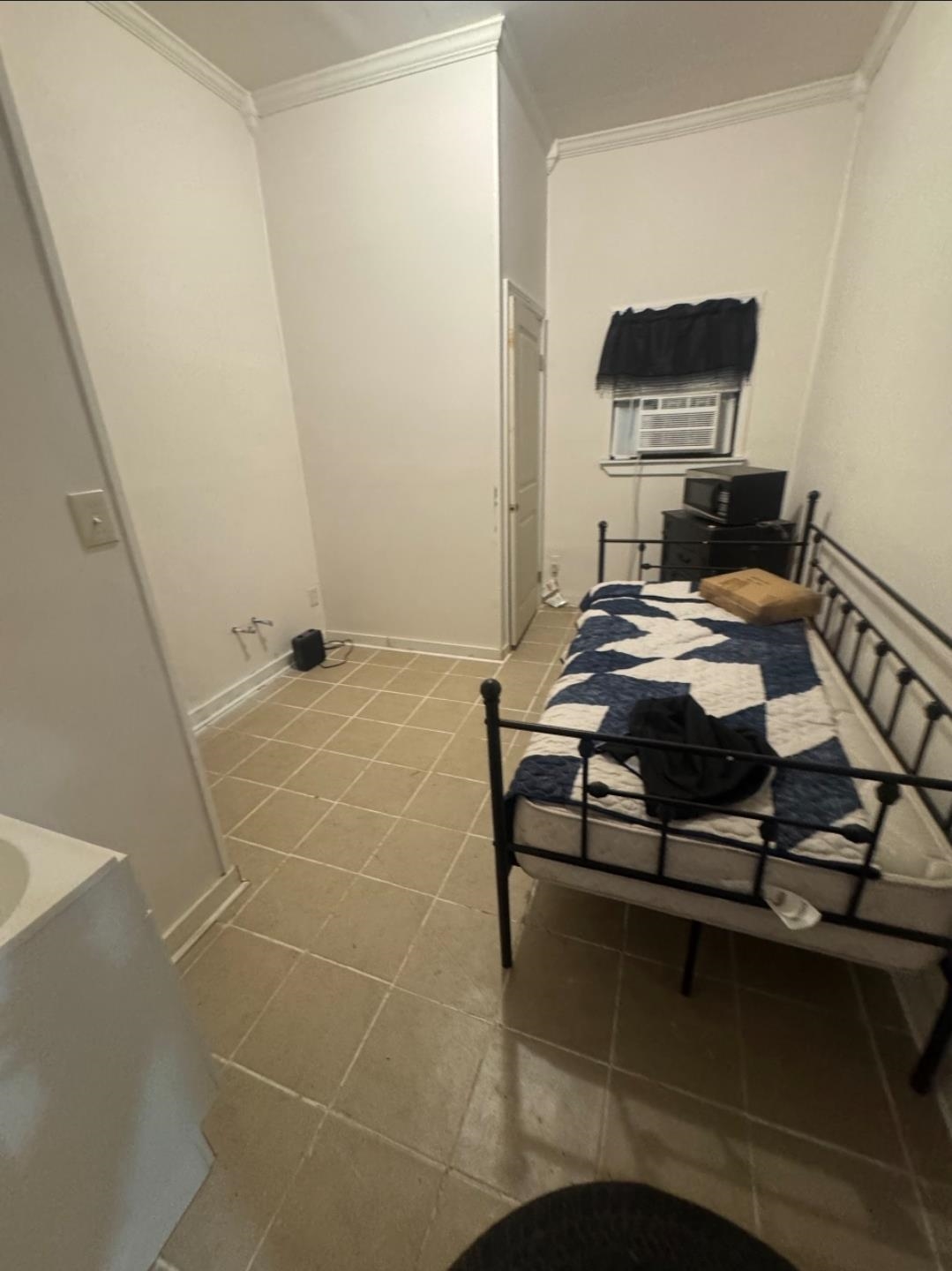 1497 Titus Road Memphis, TN 38111 - Photo 4 of 13 a bathroom with a sink and a shower