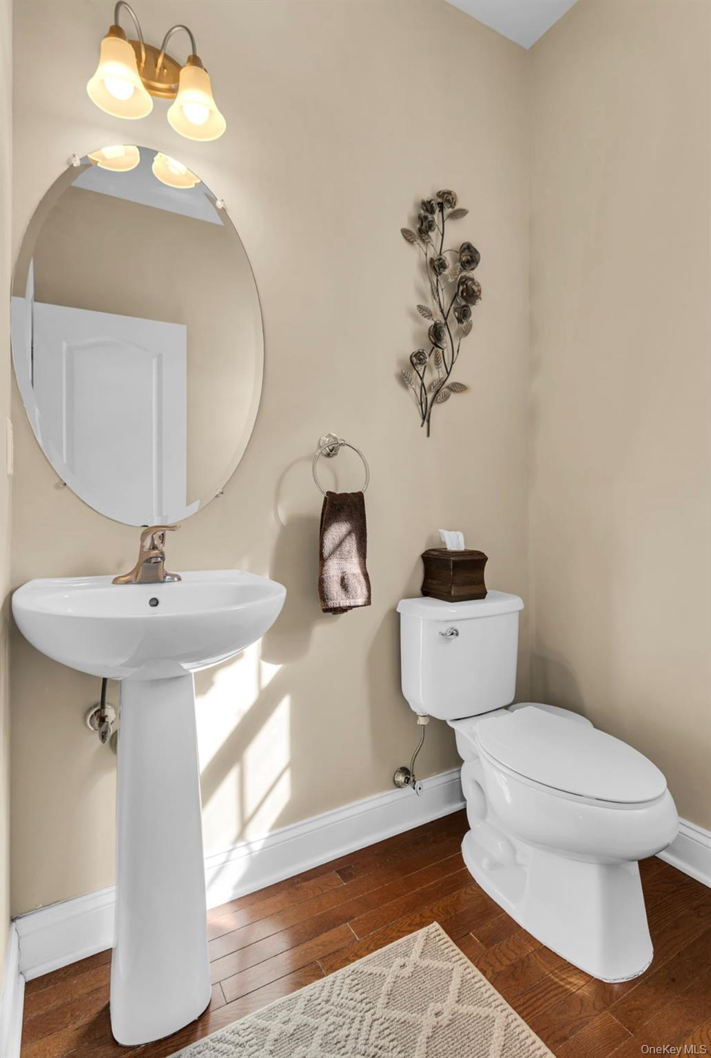 59 Luthien Forrest Road Rock Tavern, NY 12575 - Photo 20 of 48 a bathroom with a toilet sink and mirror