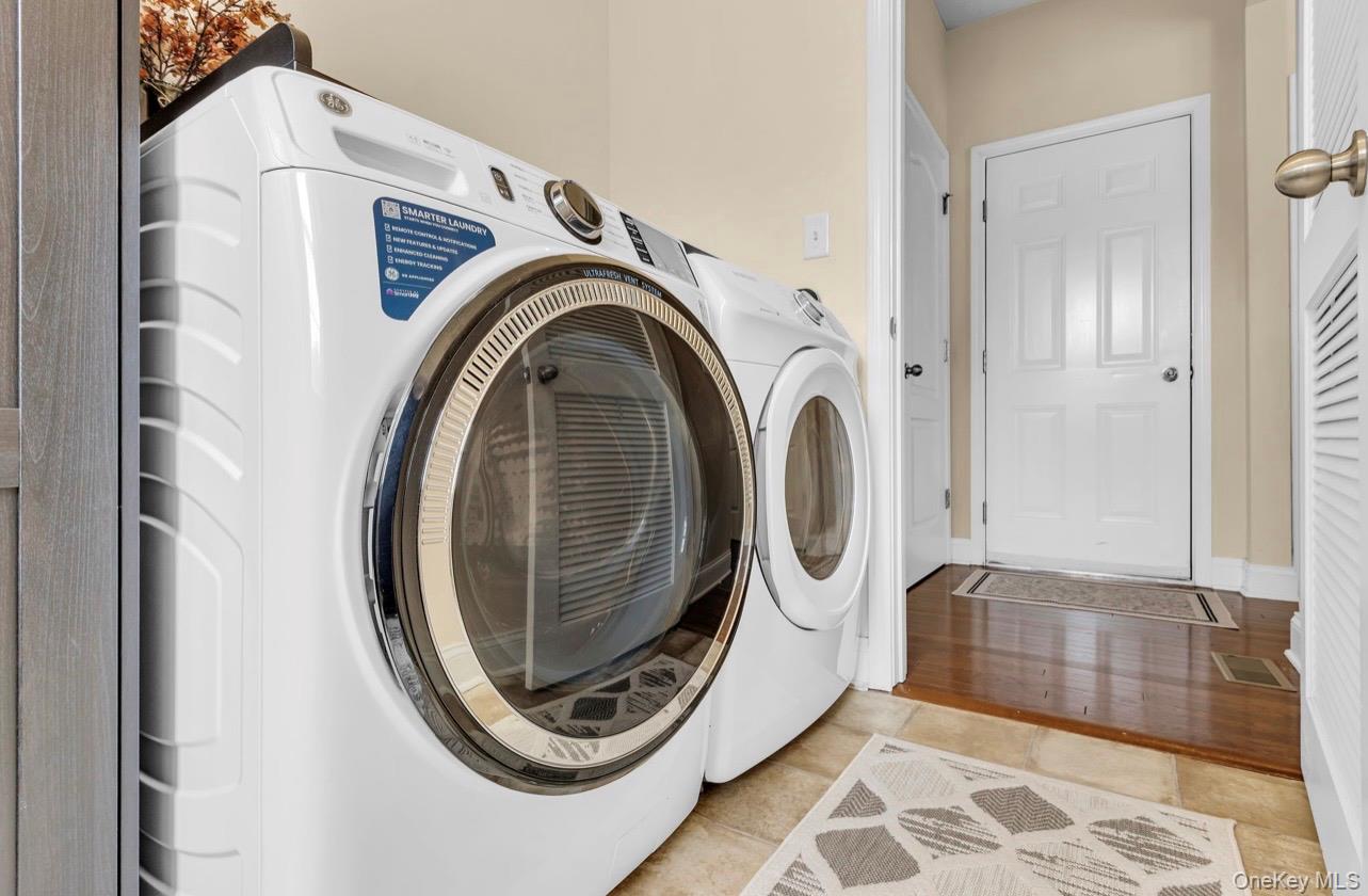 59 Luthien Forrest Road Rock Tavern, NY 12575 - Photo 21 of 48 a utility room with dryer and washer