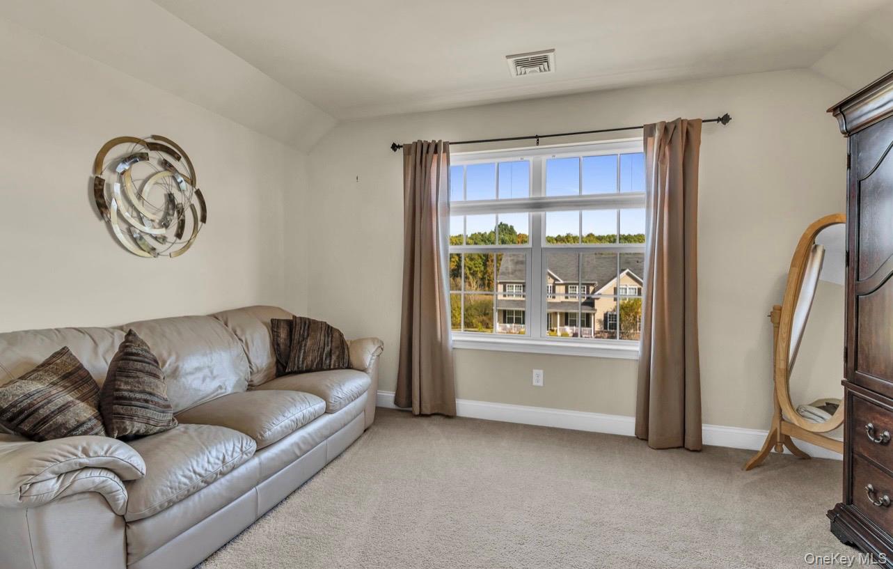 59 Luthien Forrest Road Rock Tavern, NY 12575 - Photo 27 of 48 a living room with furniture and a window