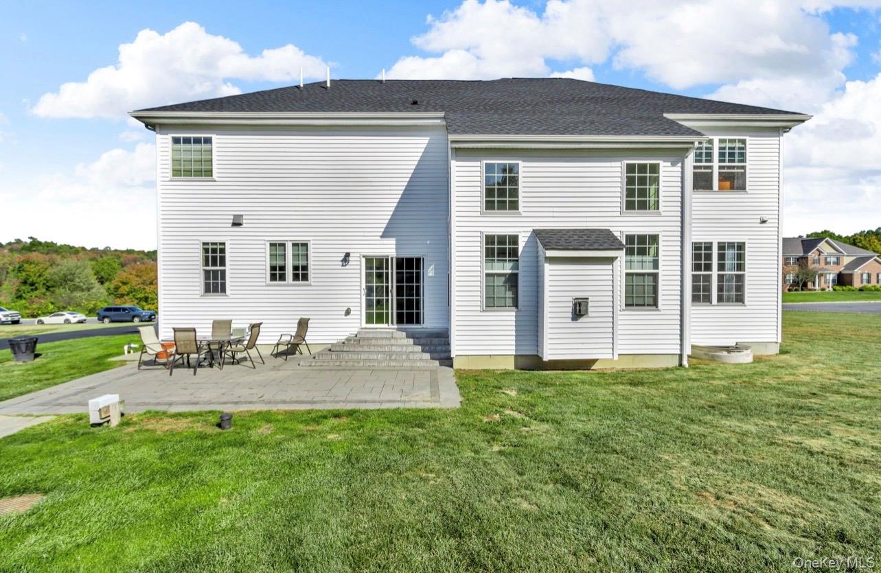 59 Luthien Forrest Road Rock Tavern, NY 12575 - Photo 38 of 48 a view of a house with a backyard