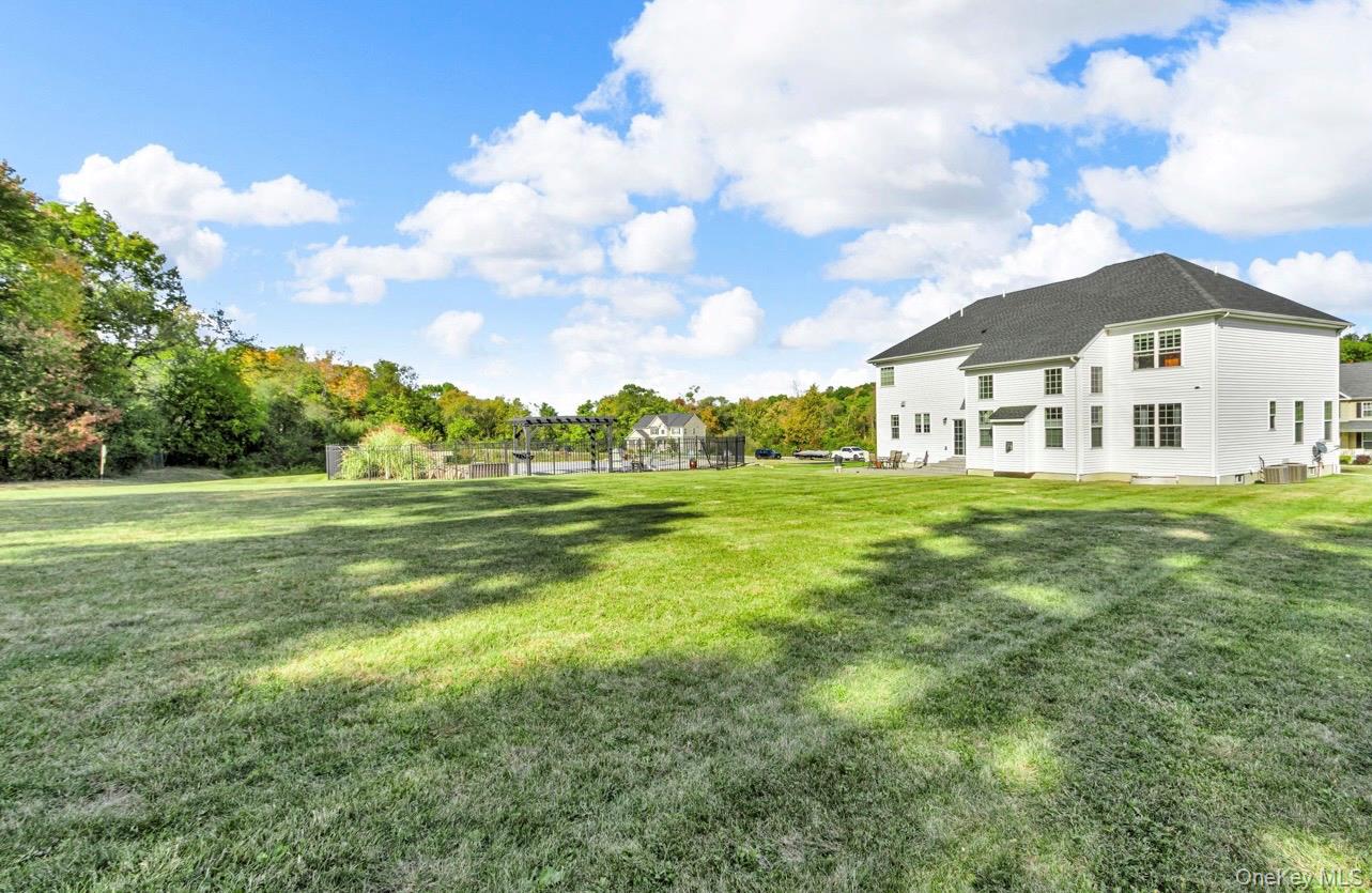 59 Luthien Forrest Road Rock Tavern, NY 12575 - Photo 40 of 48 a view of a house with a big yard
