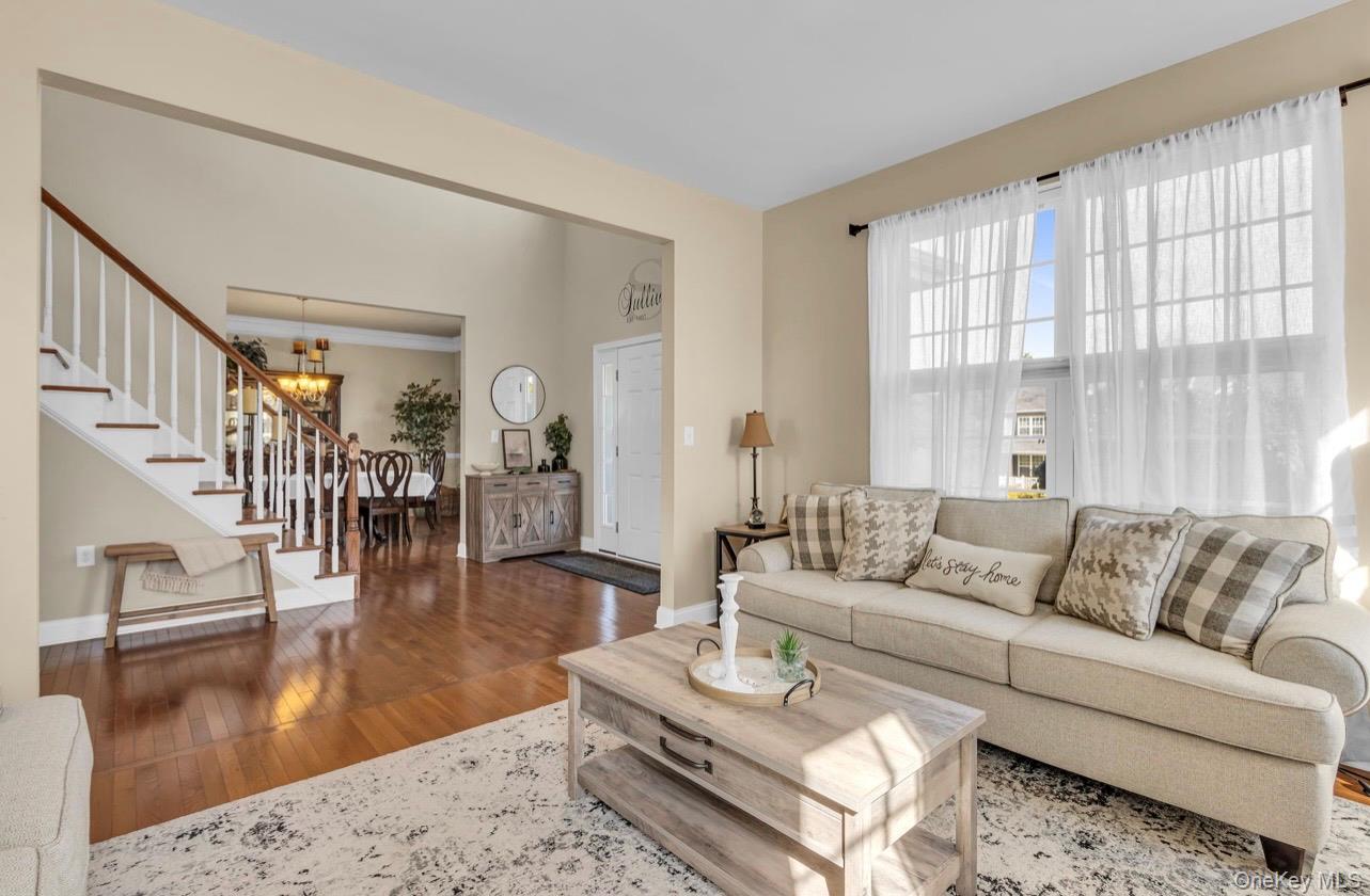 59 Luthien Forrest Road Rock Tavern, NY 12575 - Photo 5 of 48 a living room with furniture and a large window