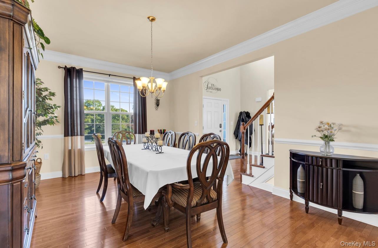 59 Luthien Forrest Road Rock Tavern, NY 12575 - Photo 8 of 48 a view of a dining room with furniture window and wooden floor