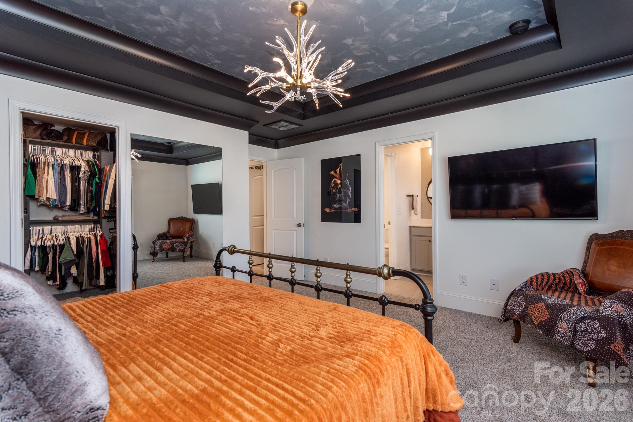 16629 Summers Walk Boulevard Davidson, NC 28036 - Photo 12 of 29 a bed room with a bed and a television