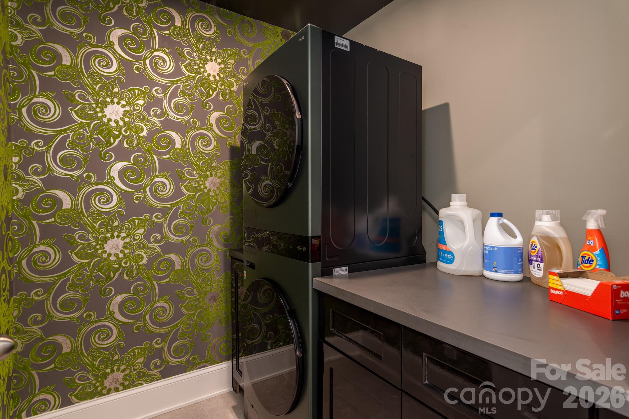 16629 Summers Walk Boulevard Davidson, NC 28036 - Photo 21 of 29 a bathroom with a sink and a mirror