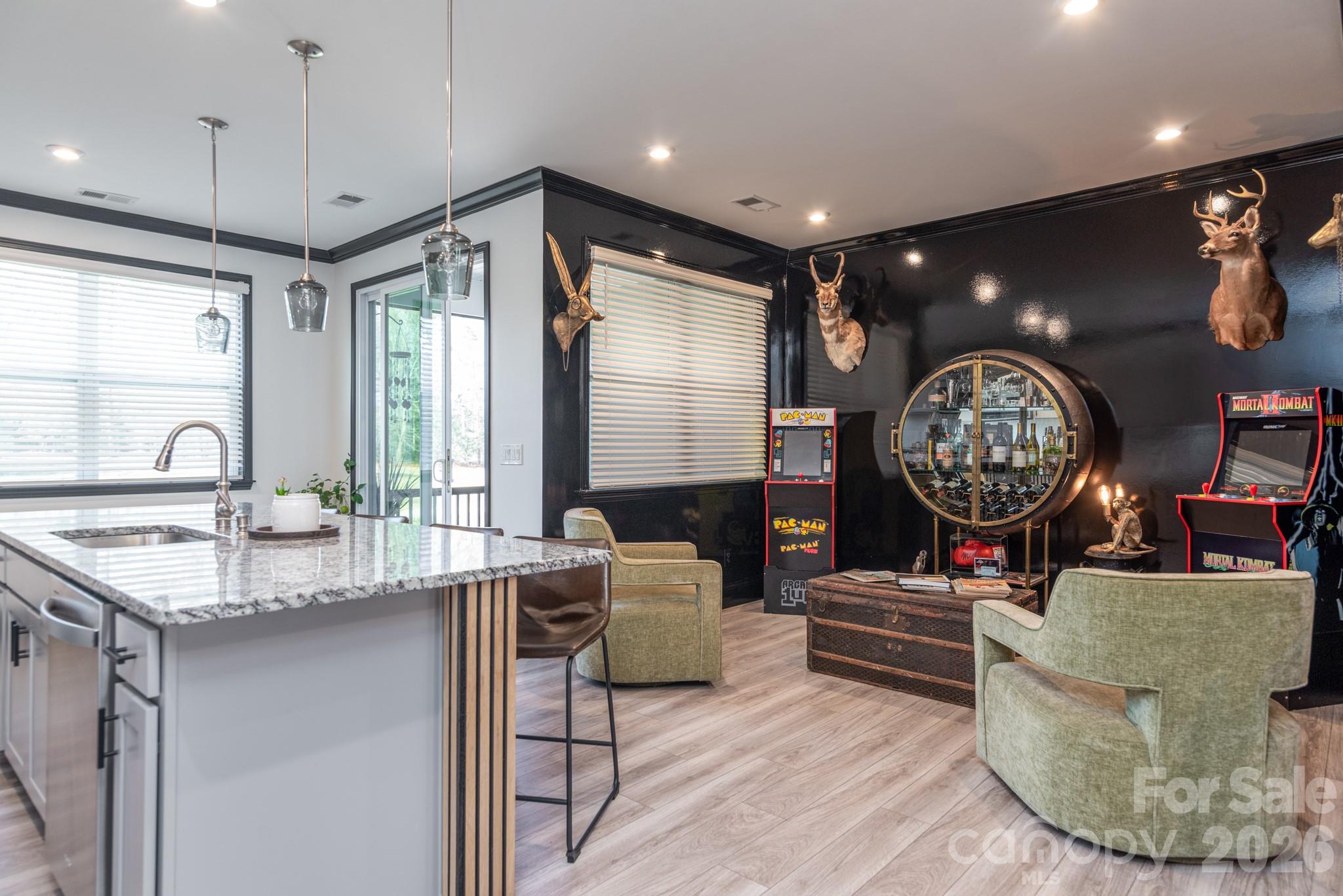 16629 Summers Walk Boulevard Davidson, NC 28036 - Photo 5 of 29 a very nice looking open kitchen with a large window and a clock