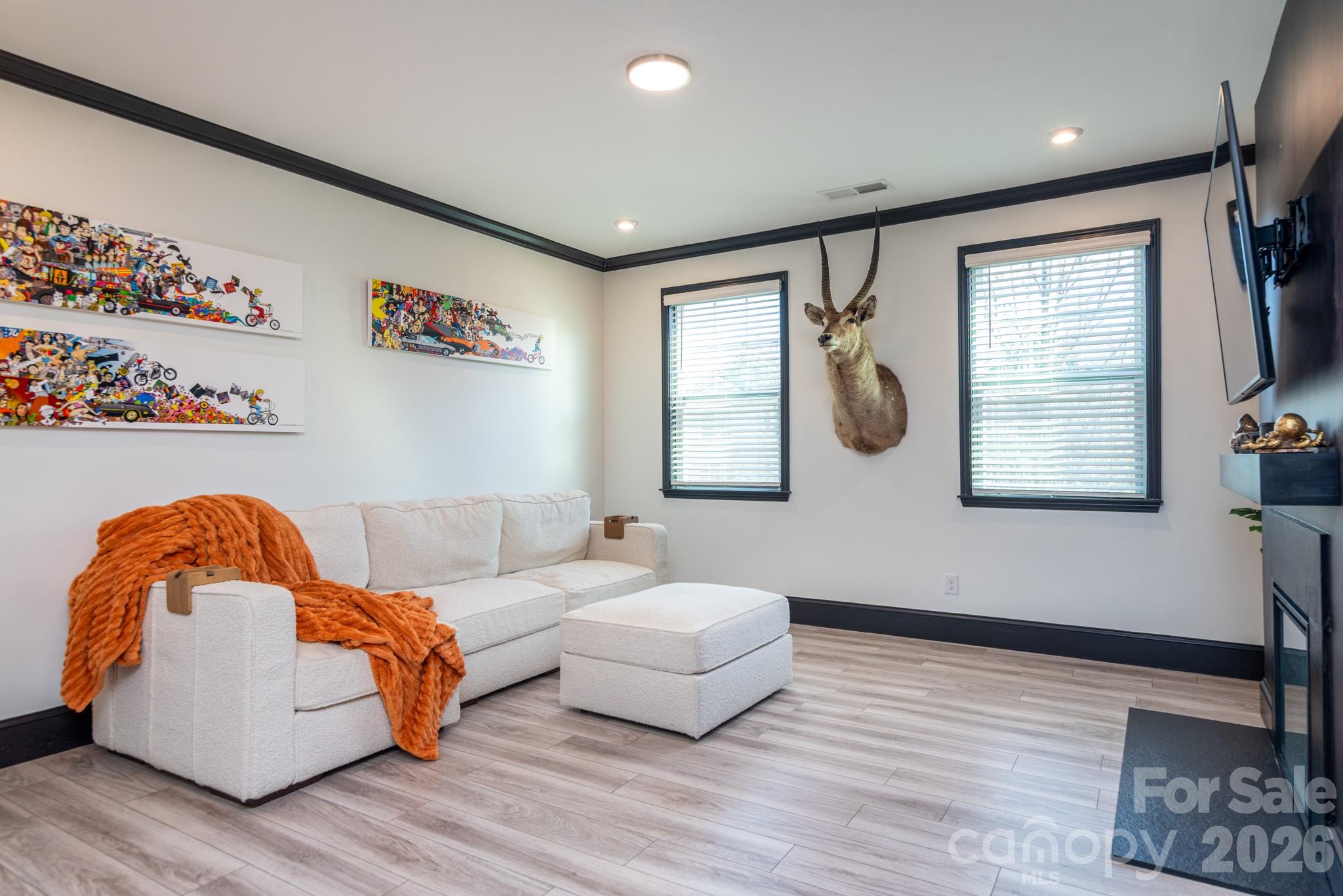 16629 Summers Walk Boulevard Davidson, NC 28036 - Photo 8 of 29 a living room with furniture and a window